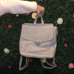 Creamy beige backpack.
